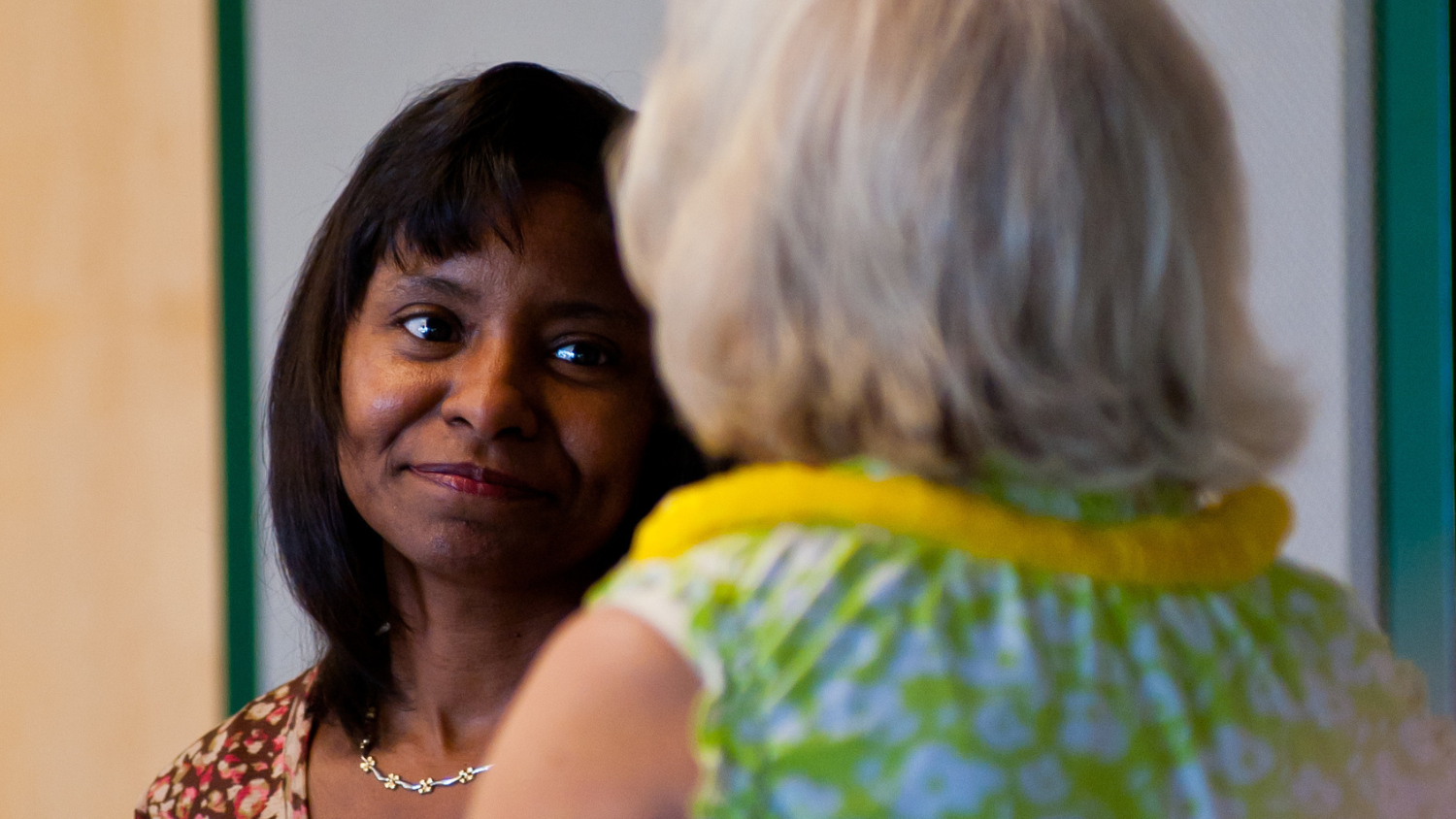 Mardecia looks at a colleague