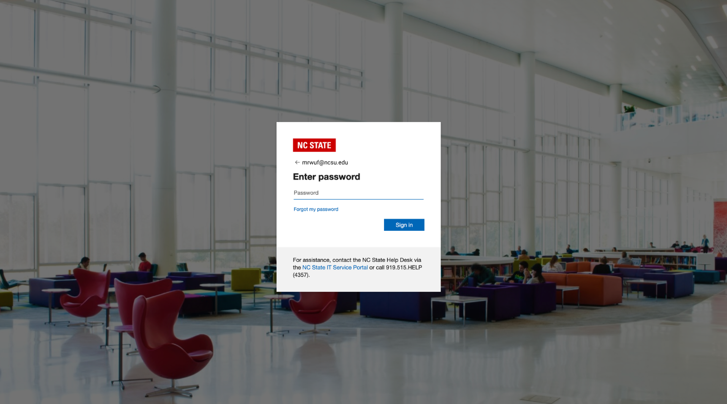 Example of the Entra login screen with a background image of Hunt Library and a box for logging in.