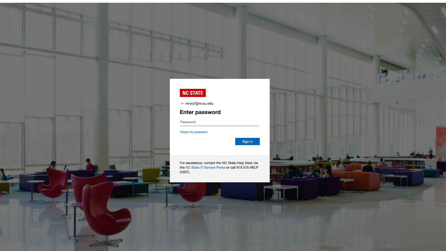 Example of the Entra login screen with a background image of Hunt Library and a box for logging in.